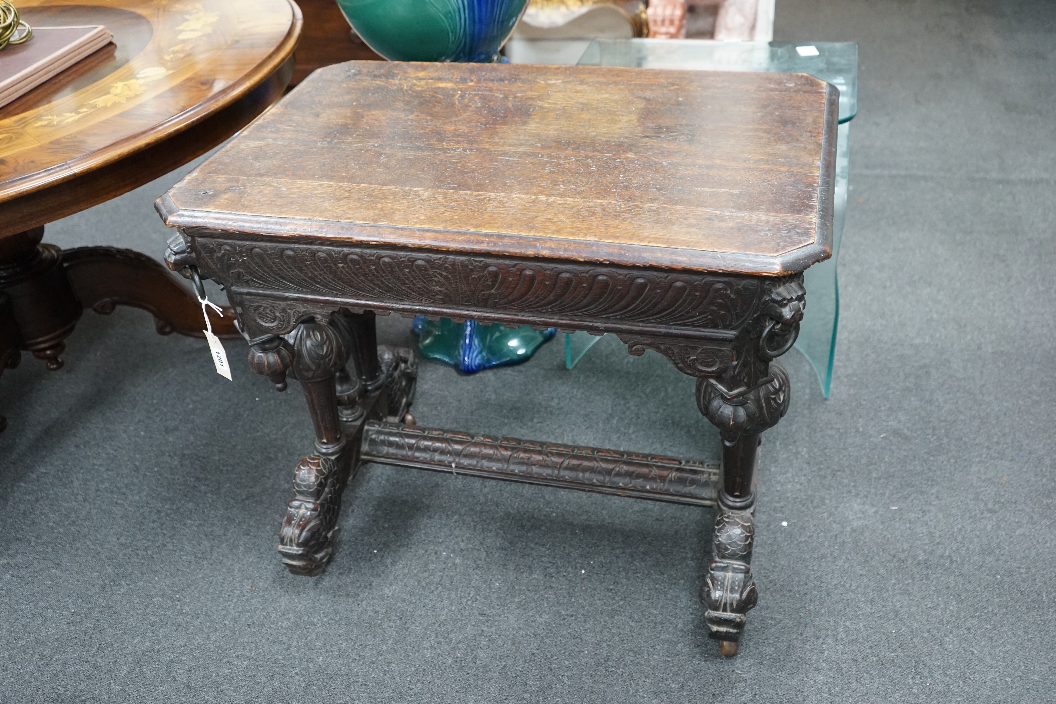 A 19th century Flemish carved oak centre table, width 82cm, depth 57cm, height 72cm